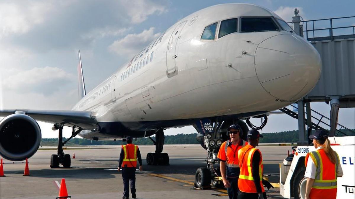 The new Delta nonstop from Raleigh-Durham International Airport to Austin, Texas, is one of several new nonstops the airline has added at RDU in the last year, including new daily service to Paris. Here, Delta employees are ready to push away Delta Flight 230, the inaugural nonstop flight to Paris, on May 12, 2016.