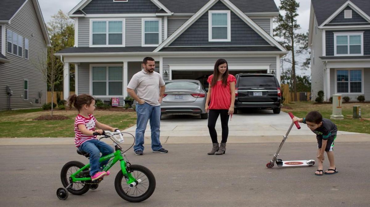 From left, Jayne, Dan, Brennin, 7, and Zoey Therrien, 2, at their home Friday, April 1, 2016 in Fuquay-Varina, N.C.