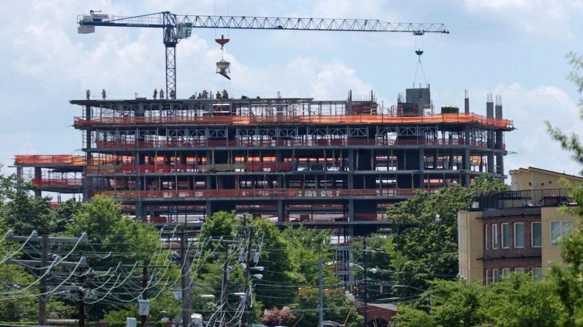 Looking west along W. Rosemary St., Chapel Hill, the two rising towers of the Greenbridge project dominate the horizon, the street and the general neighborhood.