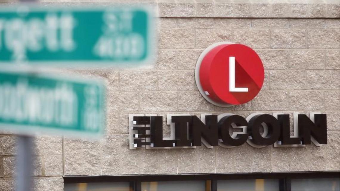 A large name and logo advertises The Lincoln, a newly-opened apartment building at the corner of Bloodworth and Hargett Streets in downtown east Raleigh, NC Wednesday, October 28, 2015. The Lincoln is one of the newest entries in the downtown Raleigh housing market.