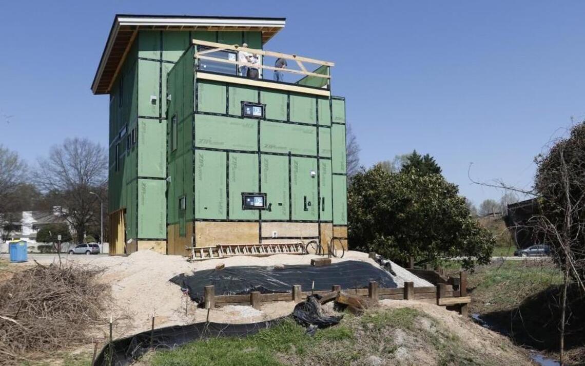 Real Deals: Curiosity abounds as modernist house rises along Wade Avenue