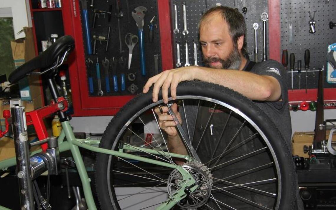 Peddling his own bike services