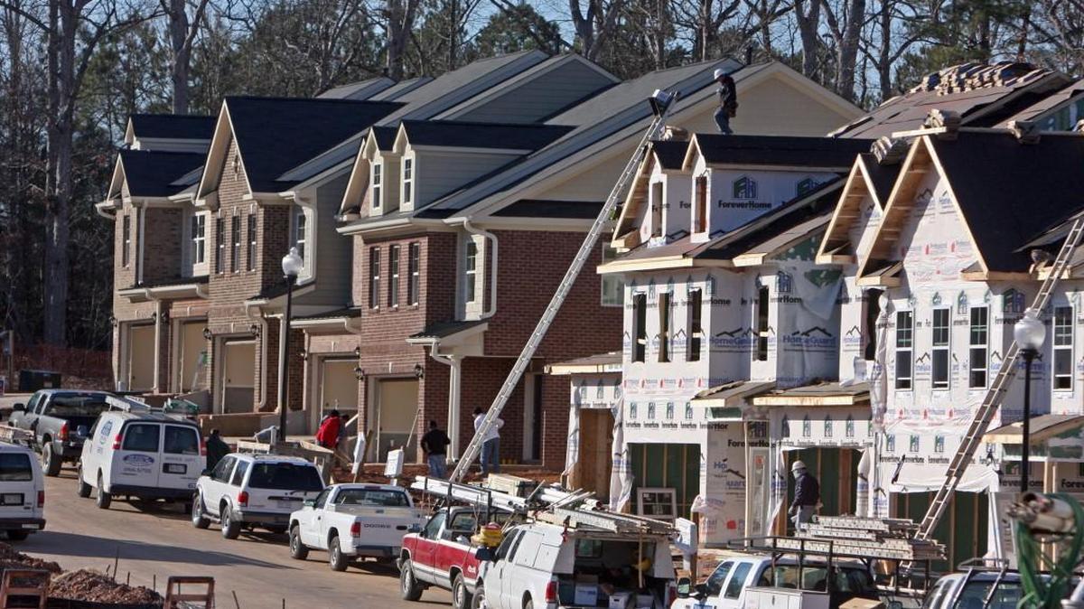 Townhomes under construction in a cul-de-sac on Langford Valley Way in Cary in the Weston Place subdivision.