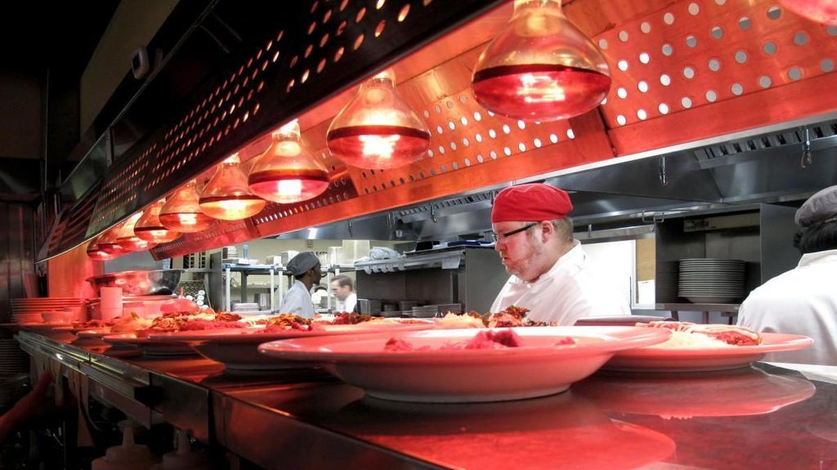 Chef Dan Hoskins of the Lucky 32 Southern Kitchen in Cary and his colleagues now own the restaurant and a couple of hotels.