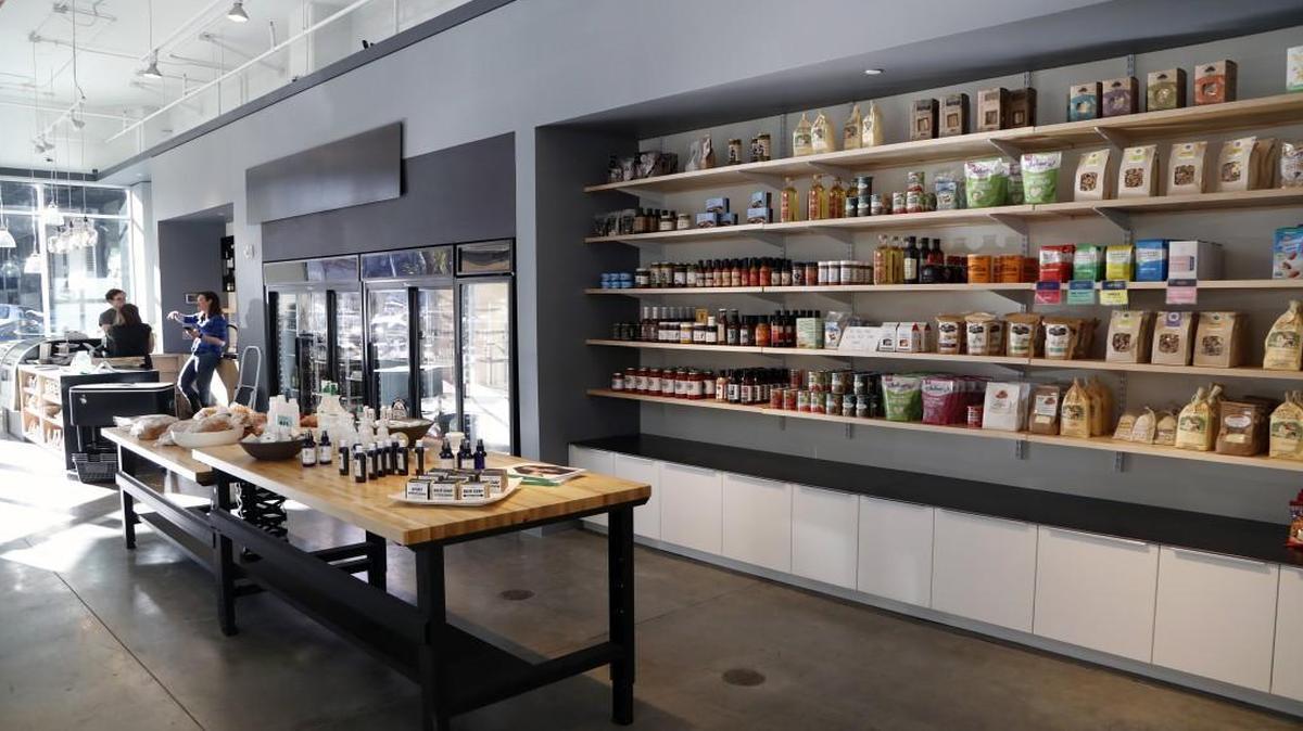 Late afternoon sunlight streams in at the new downtown specialty grocery store Raleigh Provisions on E. Davie Street in downtown Raleigh. Owner Kim Hammer also owns Bittersweet and created Provisions to focus on local ingredients and products.