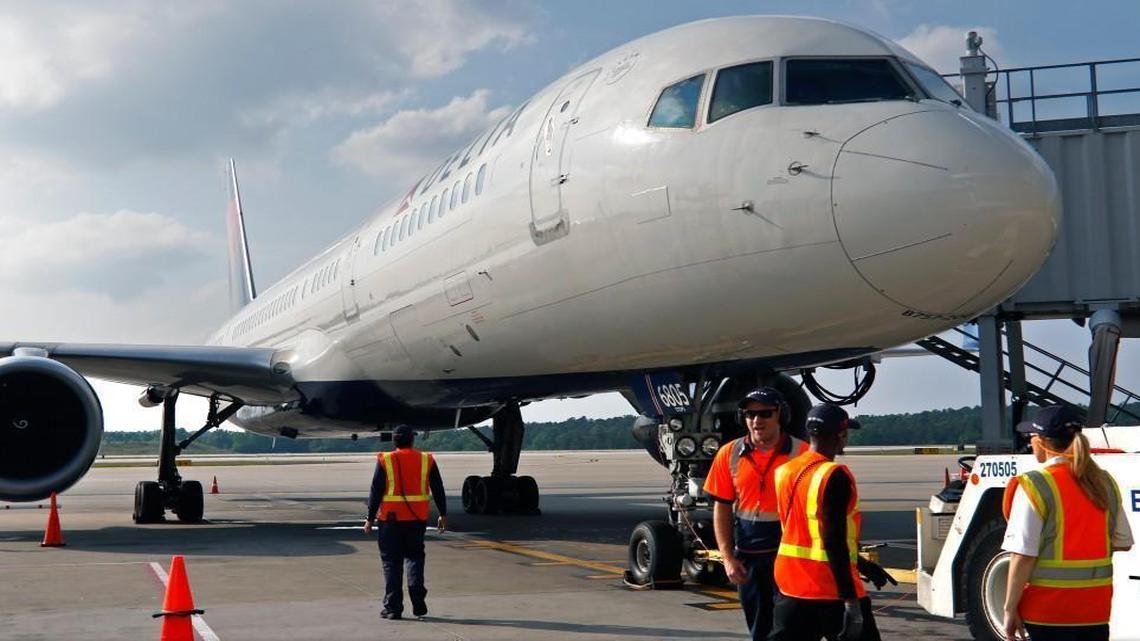 Delta Airlines employees are ready to push away Flight 230 nonstop to Paris, France, from RDU’s Terminal 2 on its inaugural flight on May 12, 2016. The airport will offer incentives in hopes of landing more new domestic and international flights.