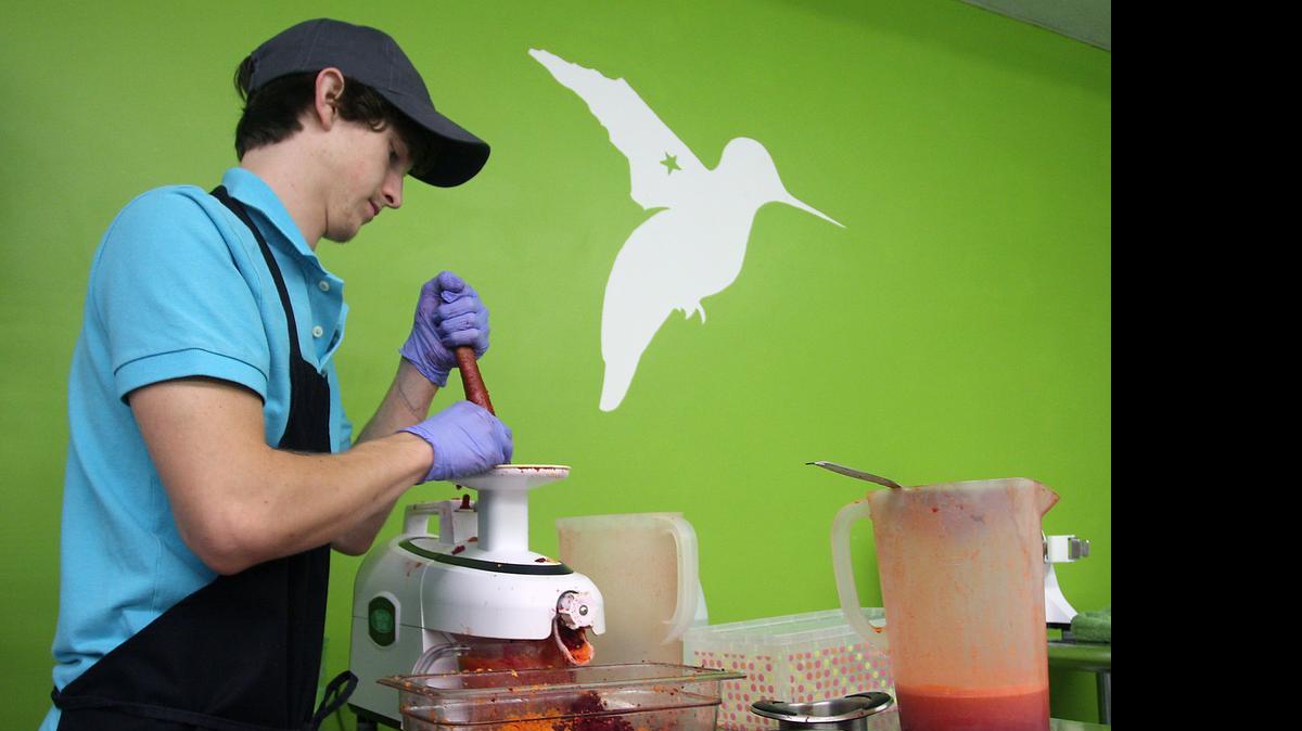 
Dakotah Davis makes a Humdinger Juice called Lift with carrots and beets at Humdinger.
