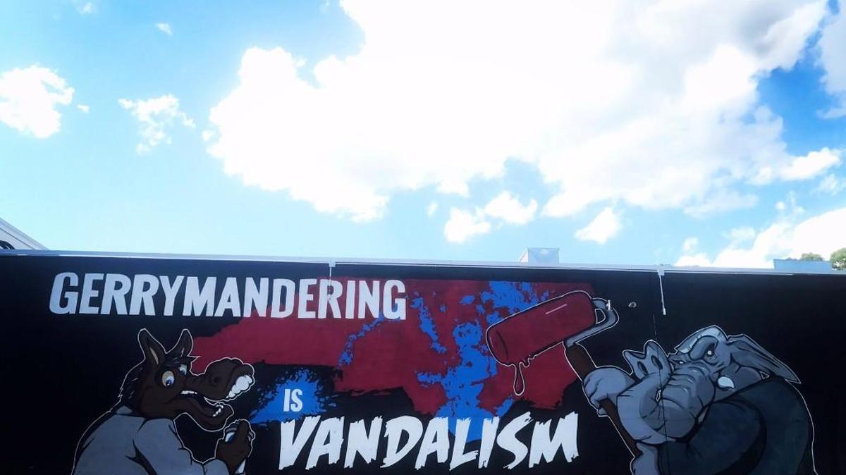 The anti-gerrymandering mural on Trophy Brewing Co. on Morgan Street in Raleigh by Oak City Mural Co.