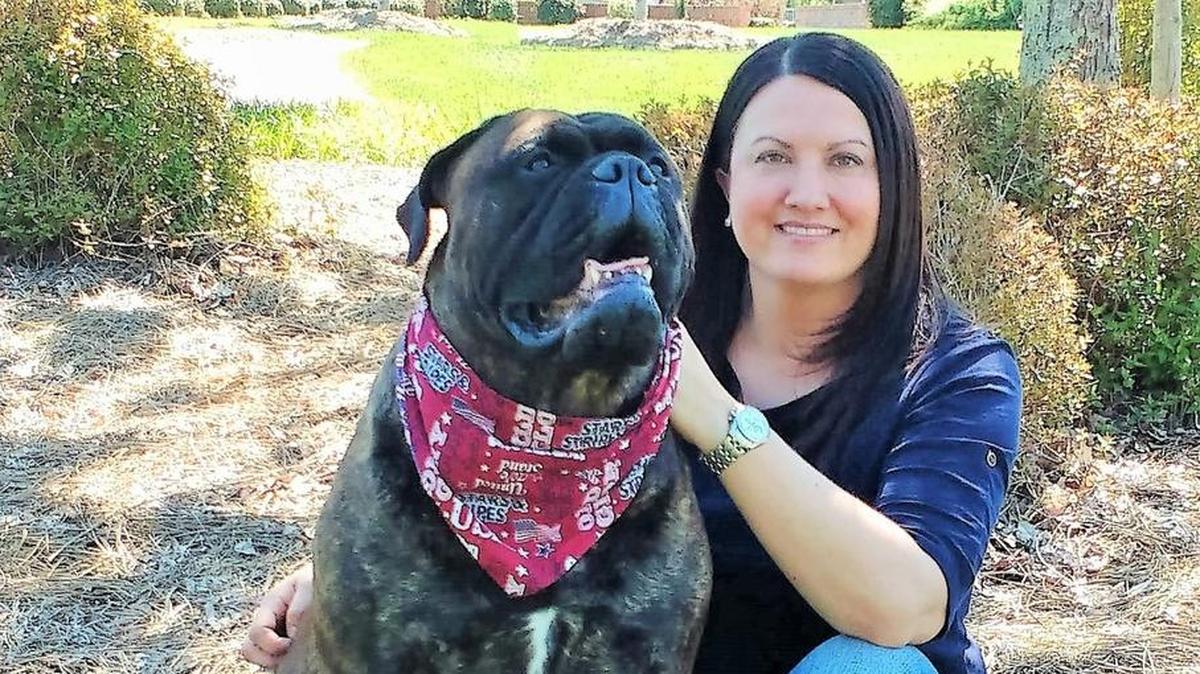 Jessica Harris, owner of K9 Salute, with her dog Tilly, a 6-year-old Bullmastiff.
