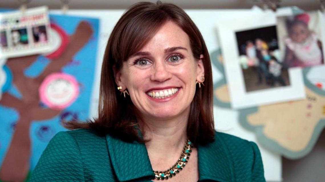 Portrait of Tarheel of the Week Kate Deiter-Maradei, 37, a professional mediator and community volunteer with the local Savation Army, Urban Ministries and other organizations. For the past five years Deiter-Maradei has hosted service parties on Martin Luther King Day as a way to connect her recently adopted daughters with their heritage. This year she had a special sheet cake made up for her girls to honor MLK Day.