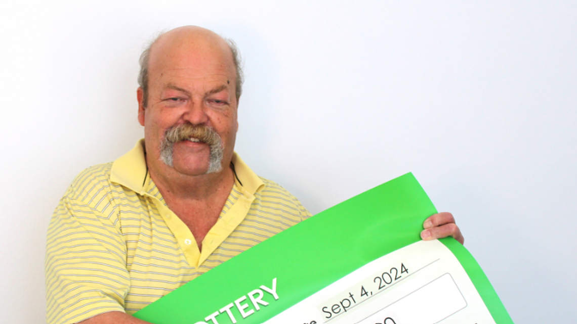 Palmer Stillman double-checked his lottery ticket after he hit the jackpot.