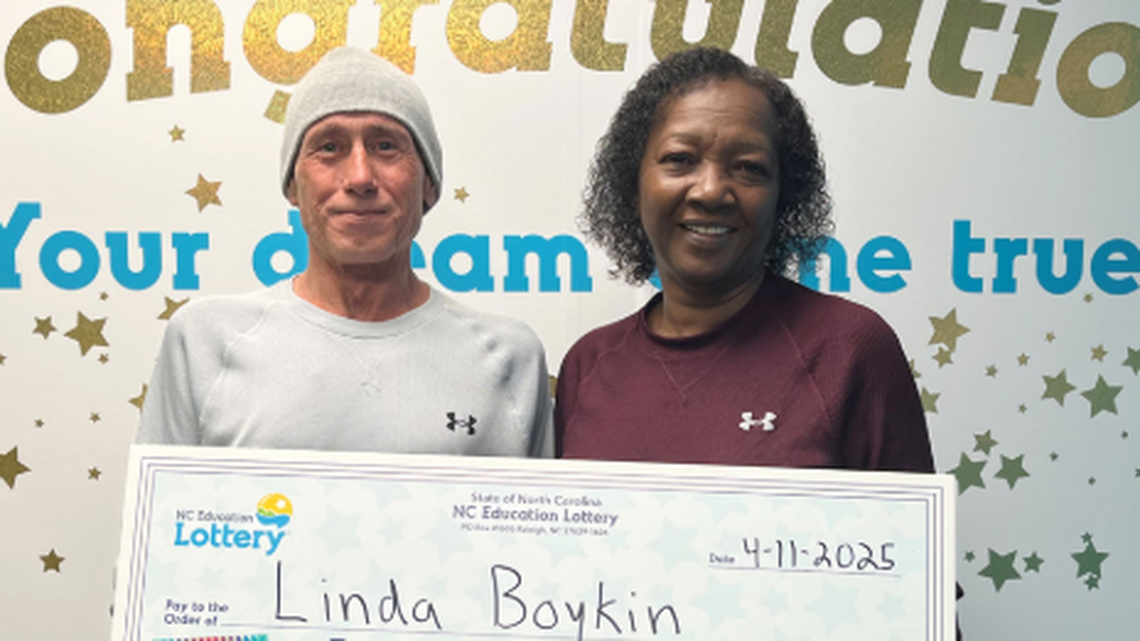 Linda Boykin, pictured with her boyfriend Wayne Evans, won a top prize in a lottery game.