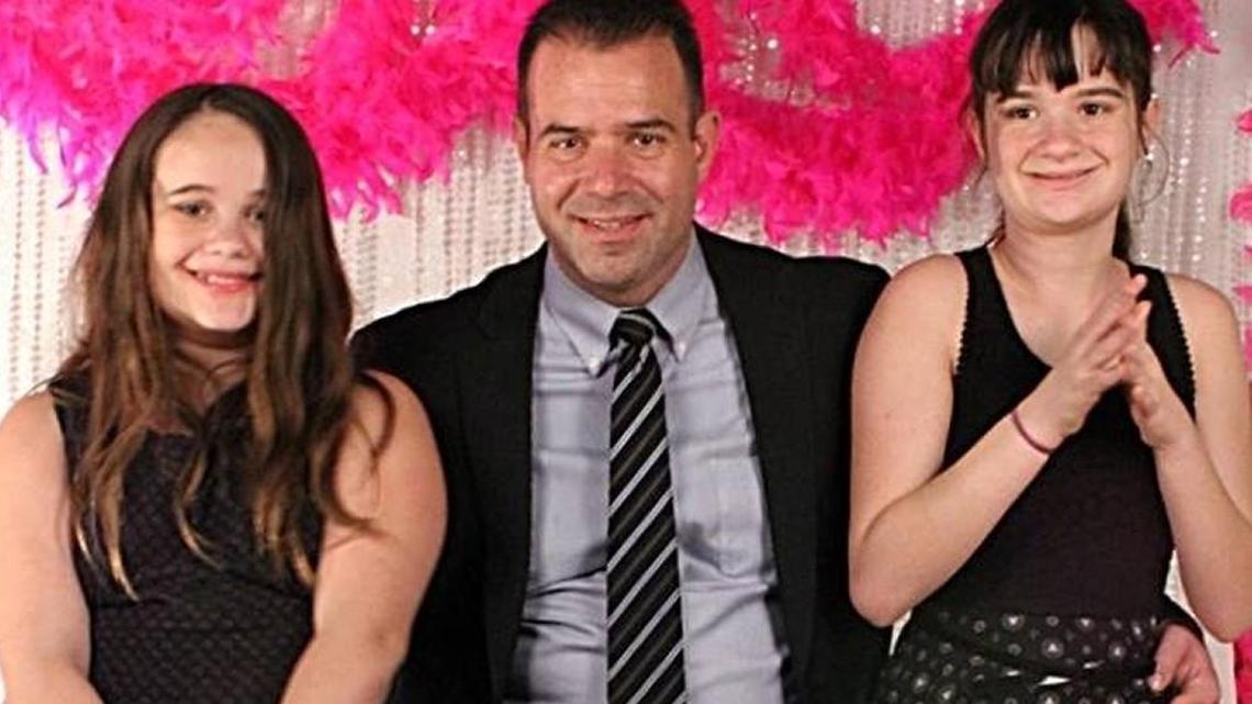 Mike Dempsey, 46, of Raleigh, and his two daughters. Dempsey survived Sept. 11, 2001 and the Las Vegas mass shooting.