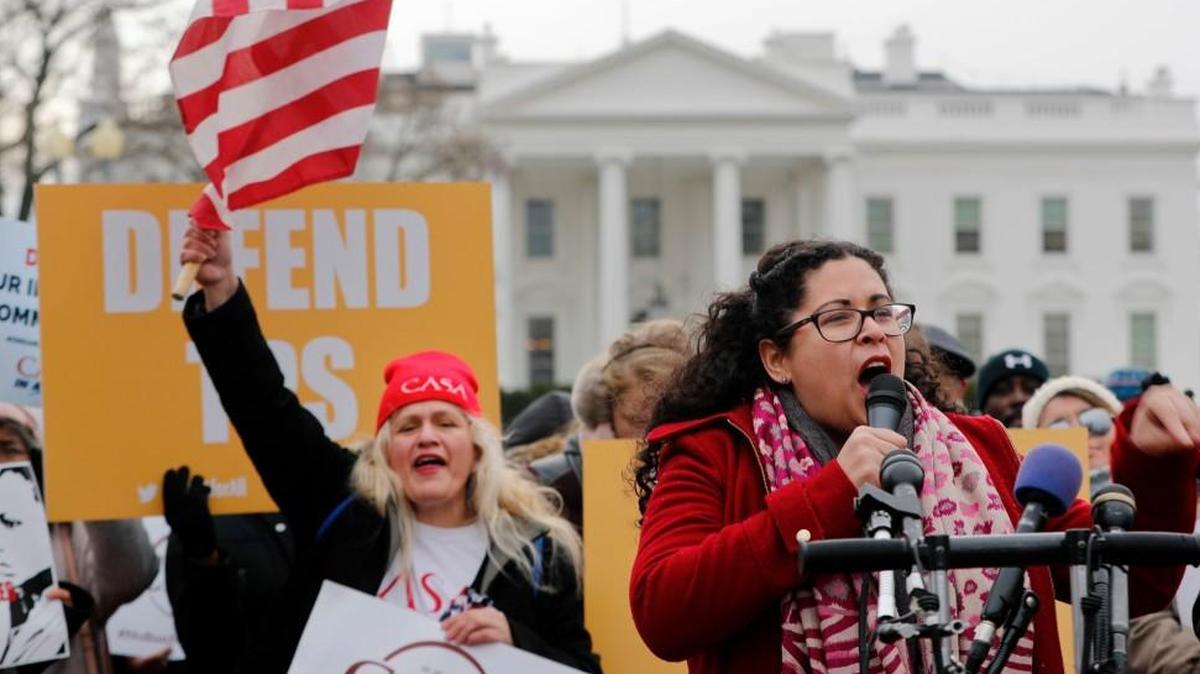 Celina Benitez, who was born in El Salvador and migrated with my family to the United States as a young child and is now a U.S. citizen, speaks during a rally held by CASA de Maryland, an immigration advocacy and assistance organization, in Lafayette Park, across from the White House in Washington on Monday. The rally was in reaction to the announcement regarding Temporary Protective Status for people from El Salvador.