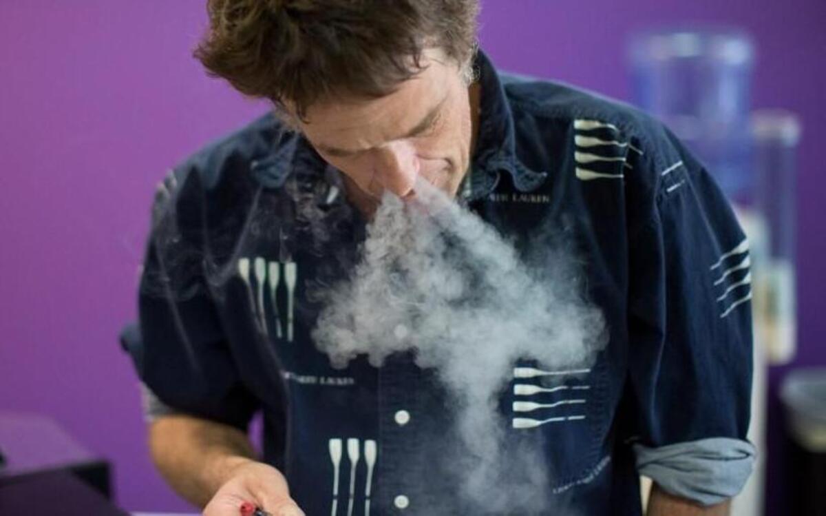 Robert Fassler tries out a new flavor in his electronic cigarette at E-Cigs in Cary, N.C. Fassler had surgery and switched from cigarettes to electronic cigarettes after his doctor’s recommended he do so to speed up the healing process.