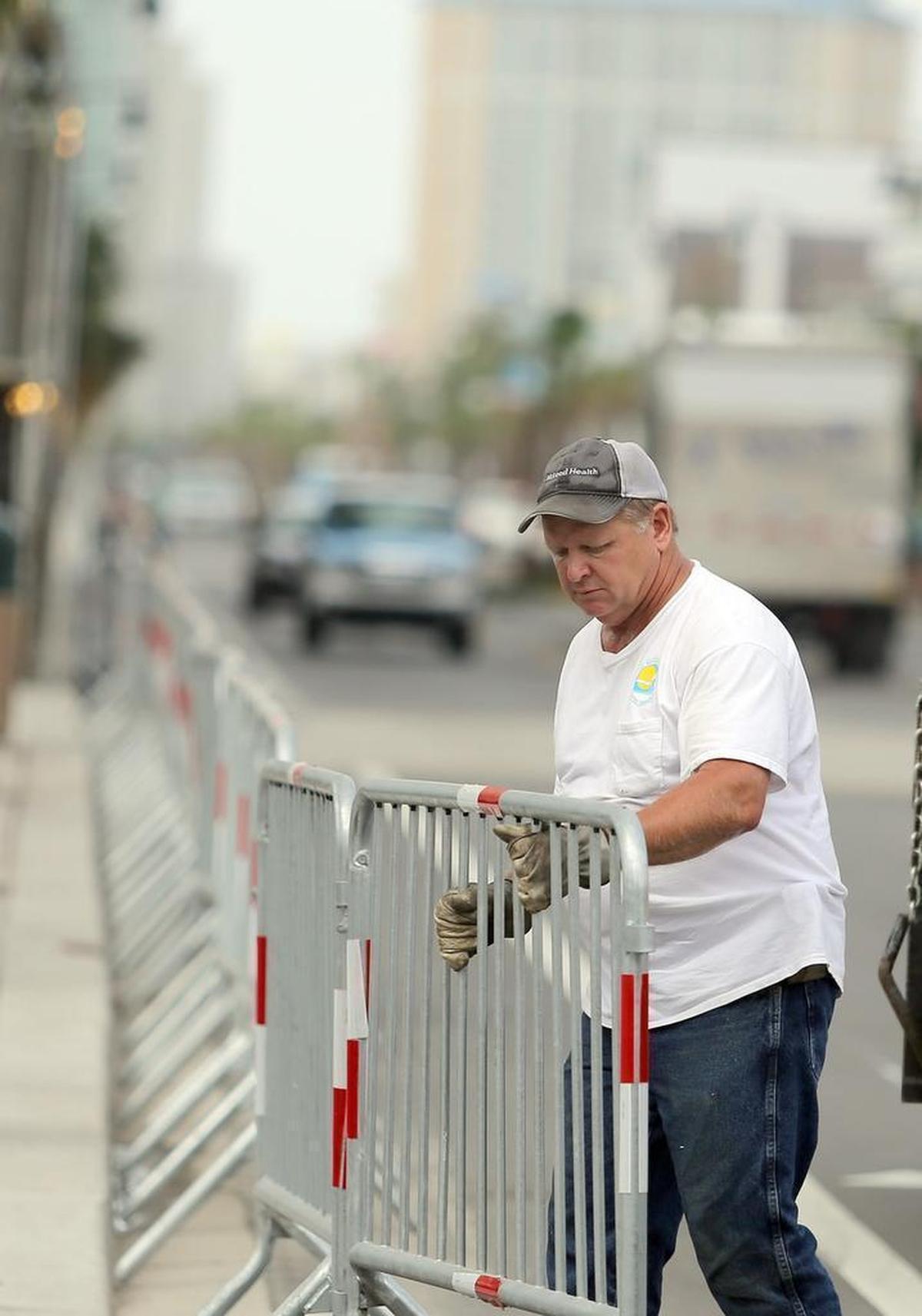 Barricades are placed on Ocean Boulevard in an effort to keep people on the sidewalks in response to the recent shootings. The barricades are being put in by Myrtle Beach's Public Works street department on Thursday, June 22, 2017.