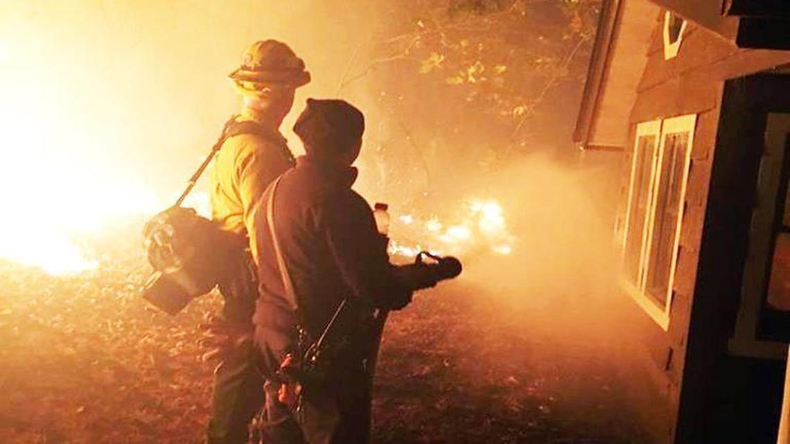 Wake County firefighters work to extinguish a fire in western North Carolina. Wake County dispatched nearly 40 firefighters and 16 vehicles, including nine brush trucks and six engines over the weekend of Nov. 12 and 13 to Lake Lure to assist with fire containment efforts and safety-related calls.