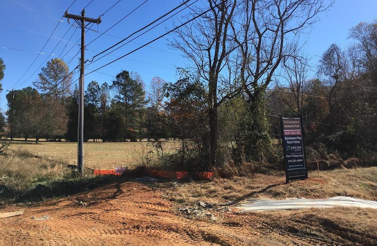 This land, between UNC’s Carolina North Greenway and the Courtyards at Homestead community, is slated for a 190-unit apartment building serving adults 55 and older. Neighbors are concerned about stormwater runoff, traffic and other issues.