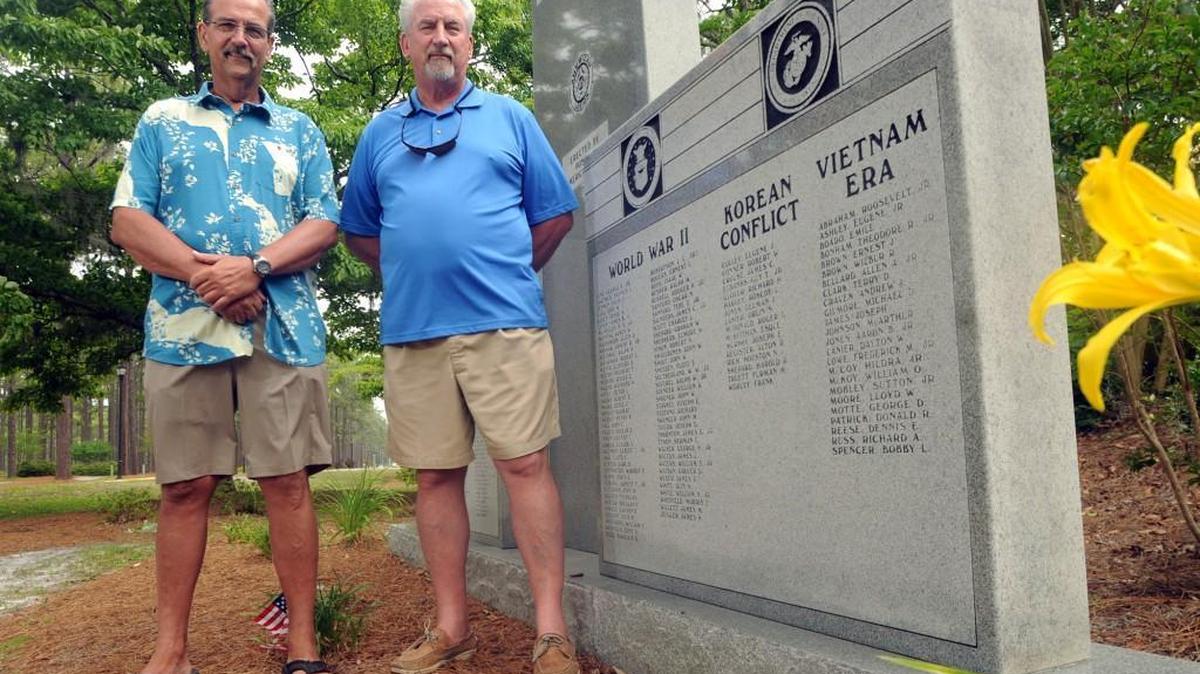 Brothers Tom and Jim Reece at the New Hanover County veterans memorial in 2013.