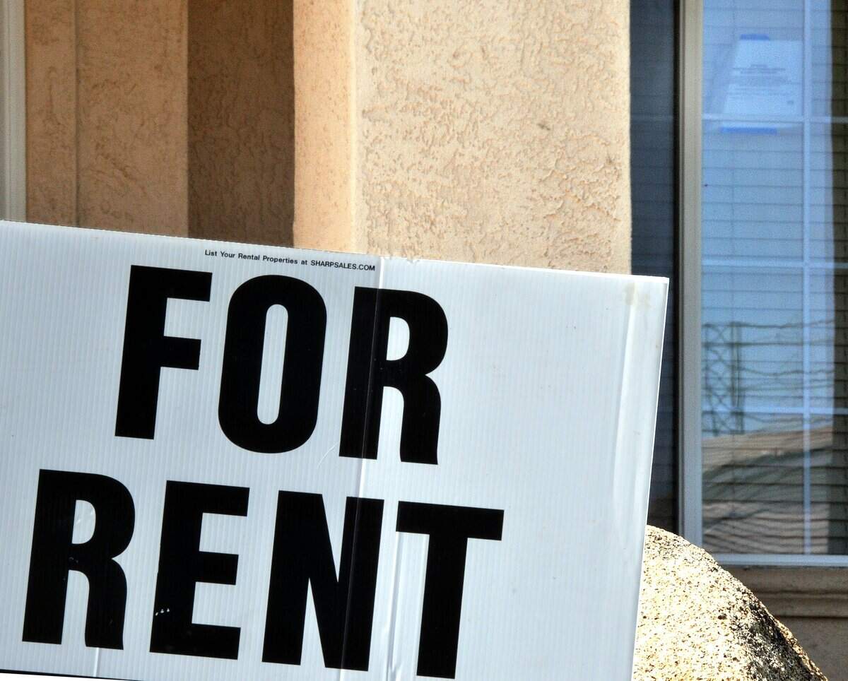 SUN-STAR PHOTO BY MARCI STENBERG Distressed homeowners with houses already up for trustee’s sale are still trying o rent them out to unwitting renters. With a note on a window, upper right, at 3745 there is still a for rent sign in it’s front yard.