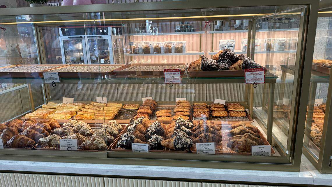 A display case at the new Raleigh bakery Tous Les Jours displays almond, chocolate and cocoa hazelnut croissants.