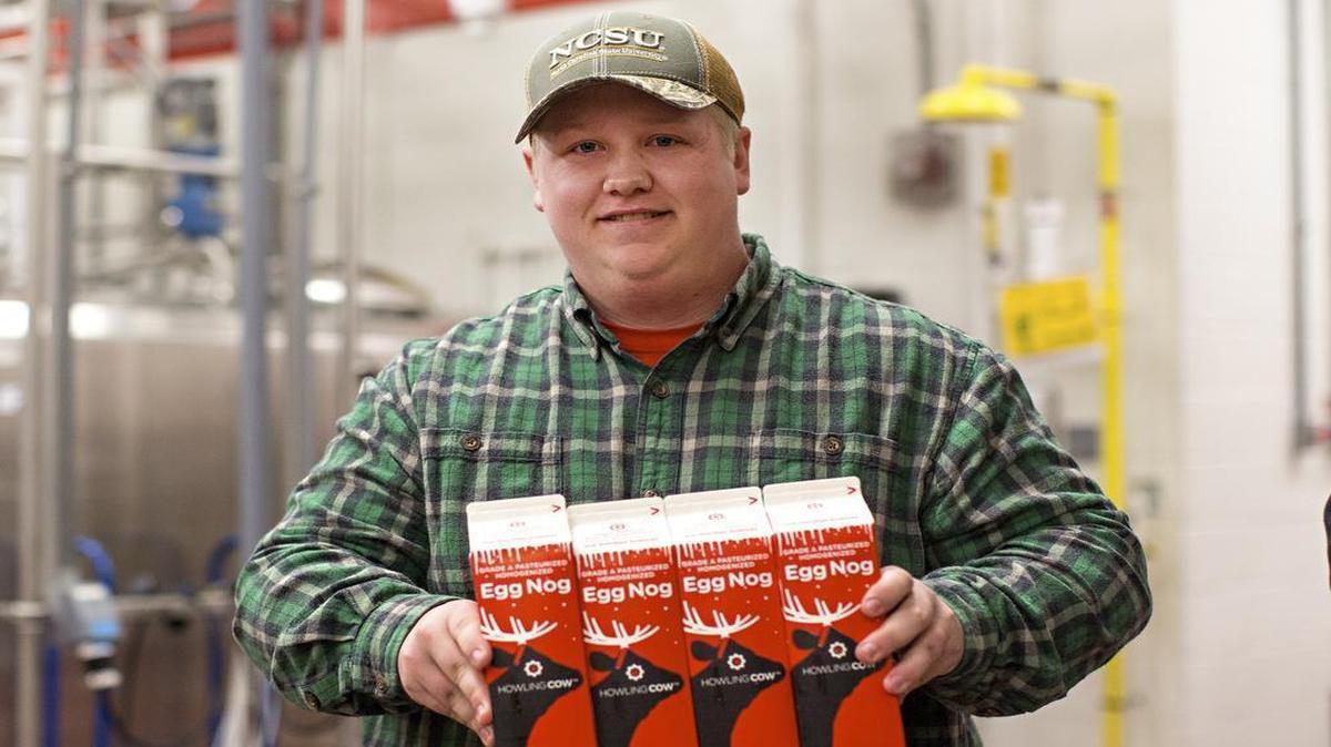 Contributing columnist Barry Saunders dreams of the day when North Carolina has a law requiring stores to sell eggnog year-round. In this 2015 file photo an N.C. State University student helps pack crates of eggnog, which Howling Cow Creamery in Raleigh still produces annually.