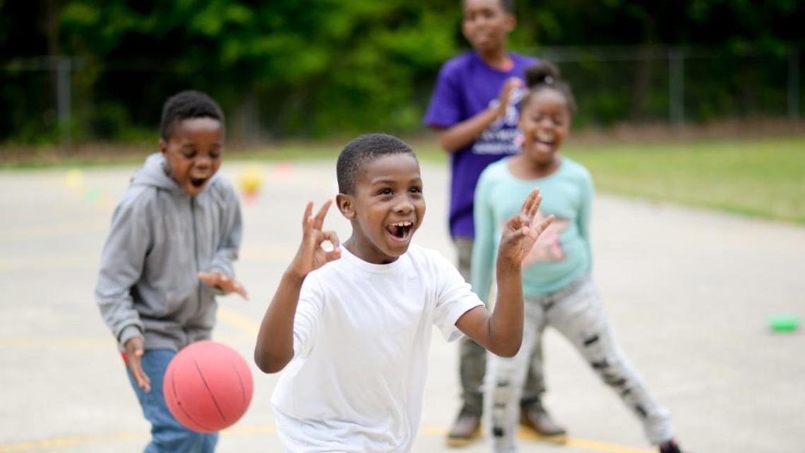 At Powell Elementary School in Raleigh, a recess coach from Playworks organizes games, makes sure everyone participates and helps the students work out any conflicts.