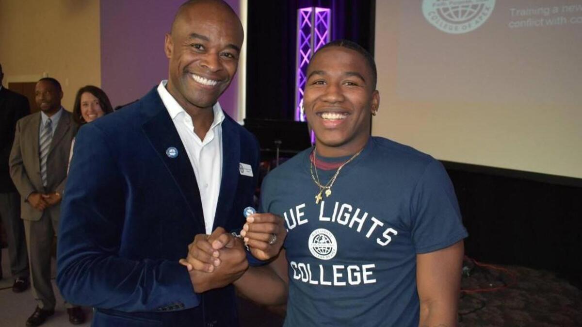 Jacques Gilbert, left, a captain with the Apex Police Department, and Richard Campbell, who moved from Youngstown, Ohio, to attend Blue Lights College in Apex.