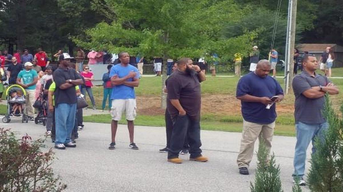 A very long line of people waited in 2016 to complete pre-registration forms to have convictions expunged from their criminal records.