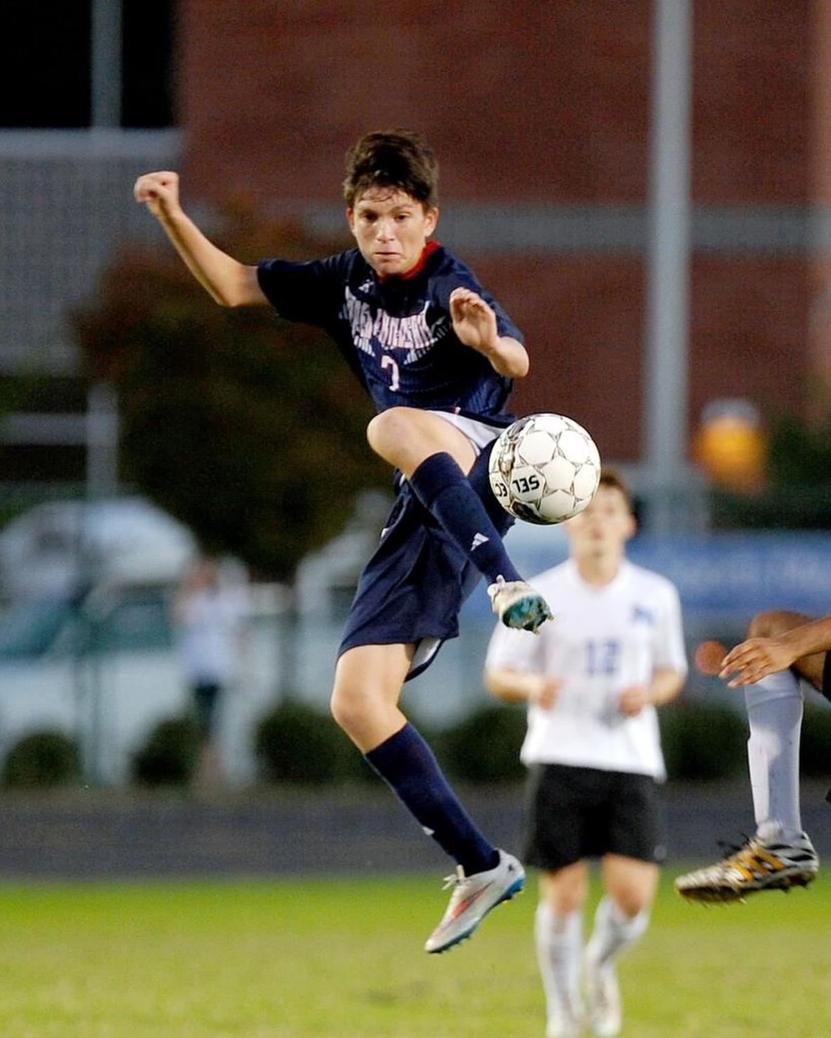 Apex Friendship's Ulises Sanchez controls a high pass during the soccer game against Panther Creek on Wednesday, October 7, 2015 in Cary. Panther Creek won 7-1.