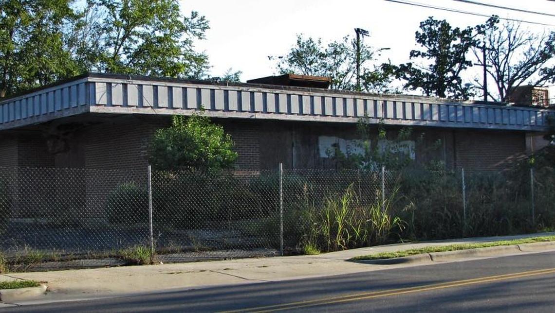 WCOM 103.5 FM launched its first broadcast in September 2004 out of this building at the corner of Weaver and Greensboro streets in Carrboro. The building was sold six years later and demolished in 2016, leaving an empty lot.