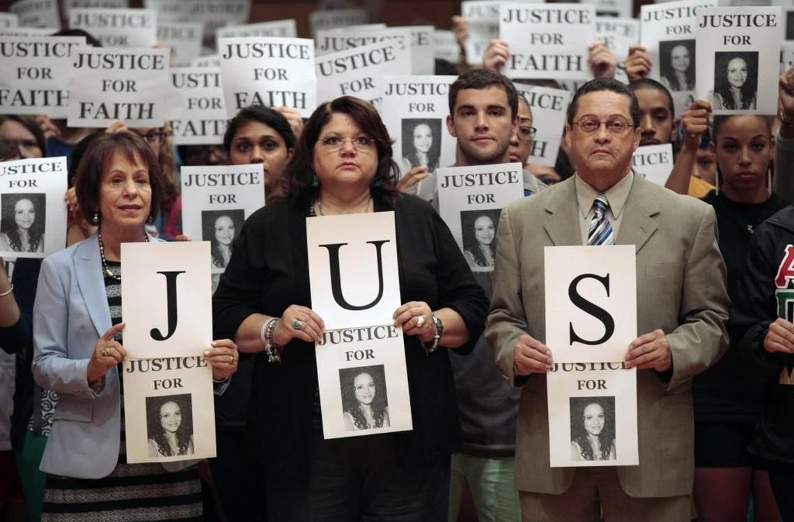 L to R: UNC-CH Chancellor Carol Folt, as well as Connie and Roland Hedgepeth, parents of UNC-CH student Faith Hedgepeth, were among the approximately 200 attendees in The Great Hall, Frank Porter Graham Student Union at UNC-CH Monday, September 9, 2014 for a Gathering for Faith to mark the second anniversary of her death and unsolved murder. The group, including the Chancellor and Hedgepeth’s parents, participated in a ‘Justice for Faith’ group photo that marks the start of a social media campaign.