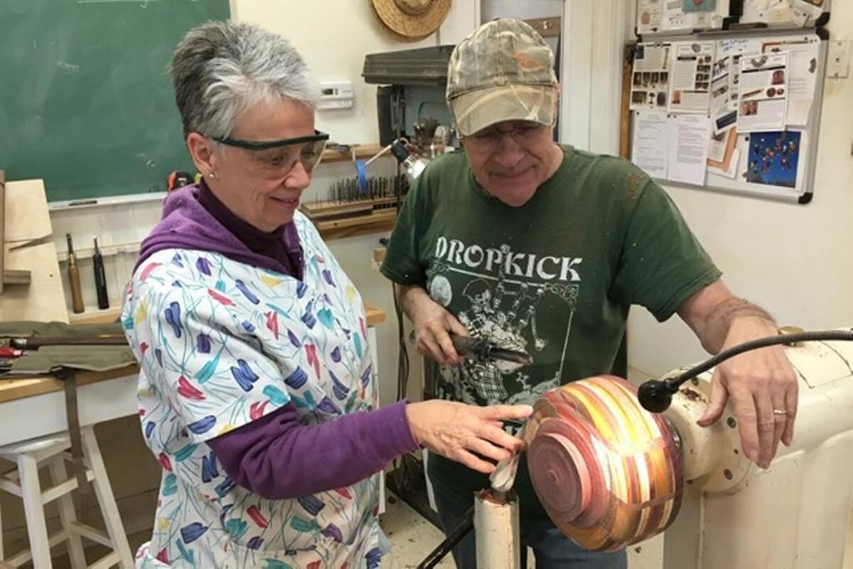 Carmine Prioli and his wife, Elizabeth, were inspired to try woodworking after their sons John and Andrew took courses from Keith Yow, the instructor in charge of the award-winning program at Cedar Ridge High School.