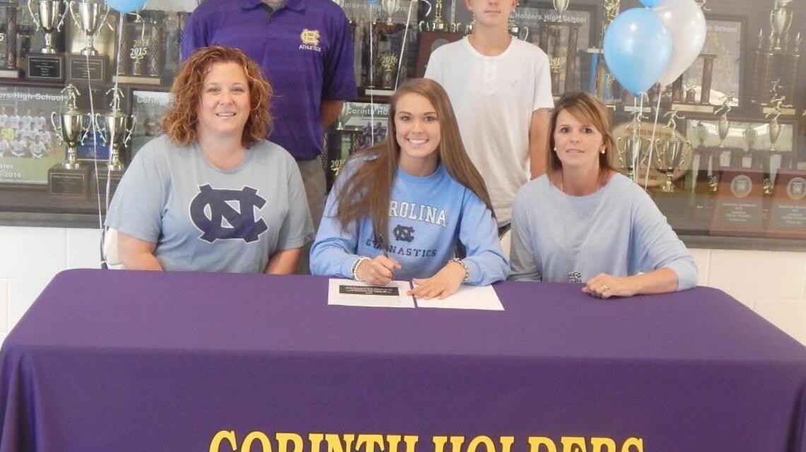 Lydia Davis signs gymnastics scholarship with UNC-Chapel Hill