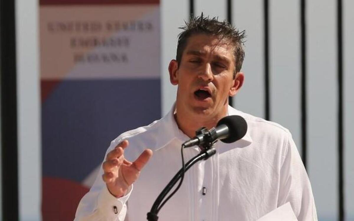 Cuban-American poet Richard Blanco recites one of his poems during the flag-raising ceremony at the newly reopened U.S. Embassy August 14, 2015, in Havana, Cuba.