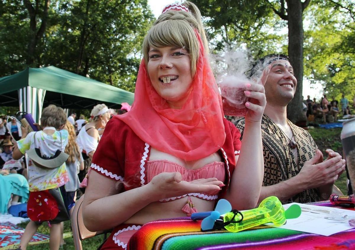 Judge Jill Anderson’s genie may have been a decade early for the “Dam! It’s the ’80s” theme as she holds a smoking pink cocktail during the 12th annual Beaver Queen Pageant on Saturday, June 4, 2016, in Durham’s Duke Park. The event raises money for the Ellerbe Creek Watershed Association, which works to reduce pollution in Ellerbe Creek, which runs into the Neuse River and Falls Lake. Duke Park neighbors started the pageant in 2005 to celebrate changing road construction plans that threatened beavers after a beaver dam-related flood.