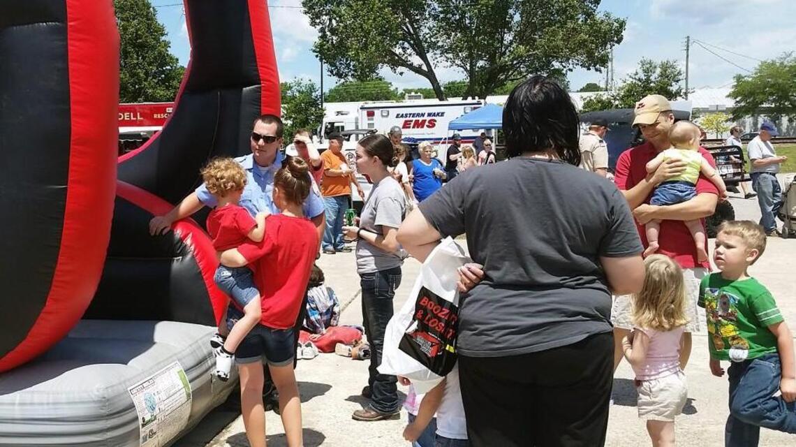 Police providing food and activities; people need only to show up