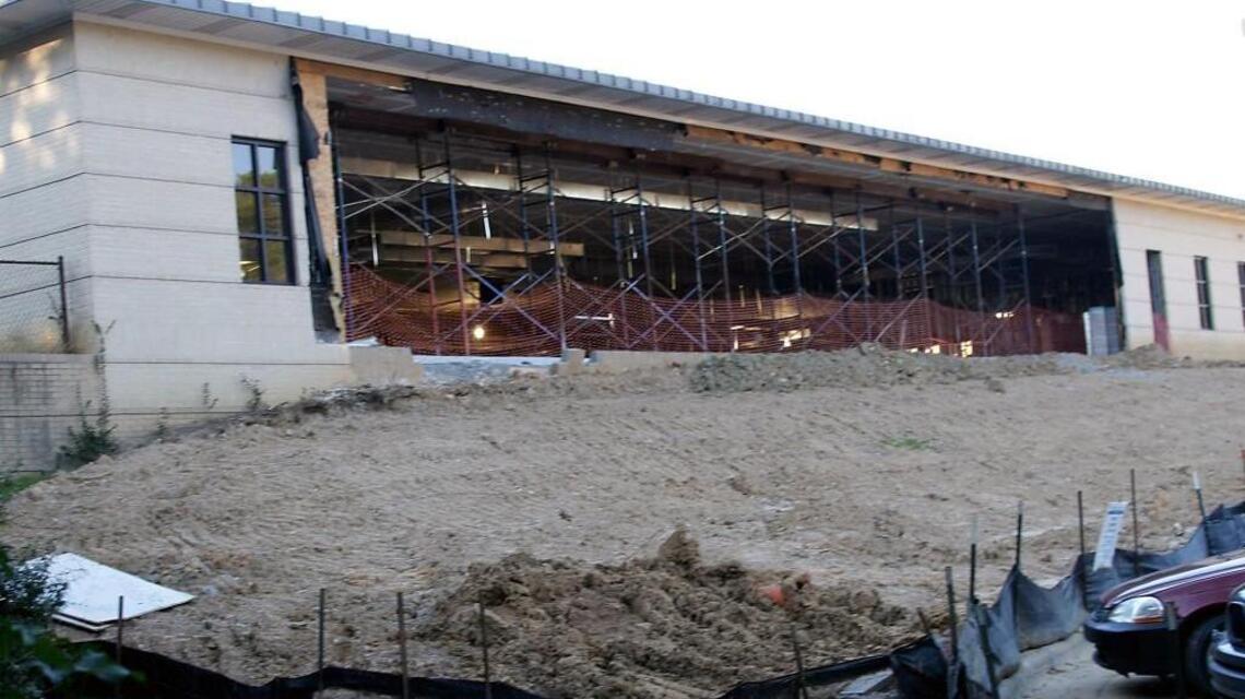 Builder files suit over Garner police station