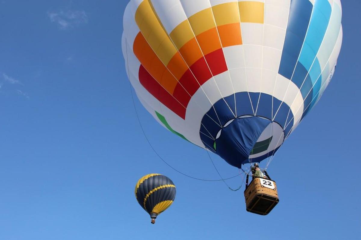 A hot air ballon rises through the air for the Freedom Balloon Fest in Fuquay-Varina, Friday, May 27, 2016. The town approved an agreement Oct. 3, 2016, that will bring the multi-day event back to Fuquay-Varina through 2021.