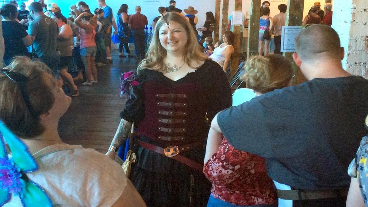 
Festival goers line up for their turn to sample local meads Saturday, Aug. 1, 2015, in the Mead Hall at Chatham Marketplace. The fifth annual event, in addition to celebrating mead, or honey wine, also featured arts and crafts vendors, demonstrations and live sword-fighting with the nonprofit Knightly Order of the Fiat Lux.
