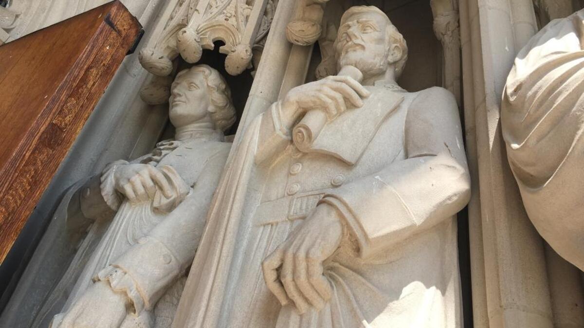 An image of Confederate Gen. Robert E. Lee (center) is among the statues that adorn the entrance to Duke Chapel. A Duke Divinity School alumnus, Ocracoke minister, Richard Bryant, wants Duke University officials to plan to remove or disavow it.