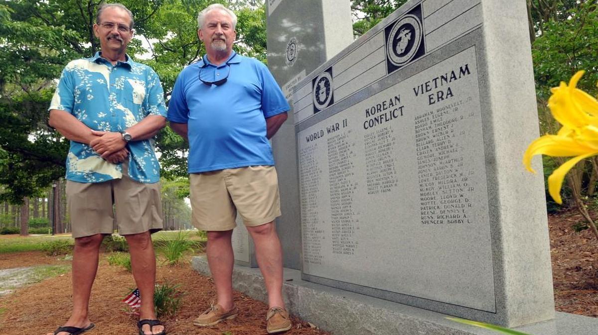 Brothers Tom and Jim Reece at the New Hanover County veterans memorial in 2013.