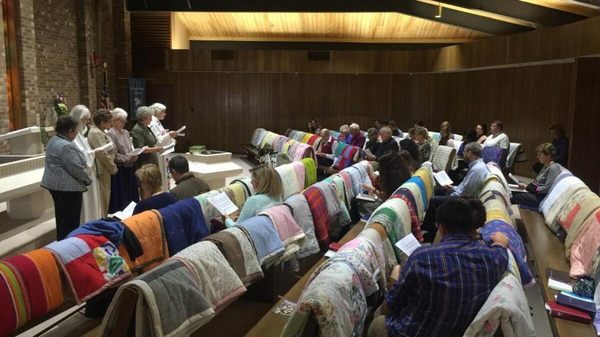 Christus Victor Lutheran Church in Durham made 143 quilts to be sent to refugees worldwide, blessing them Sunday during the morning service.