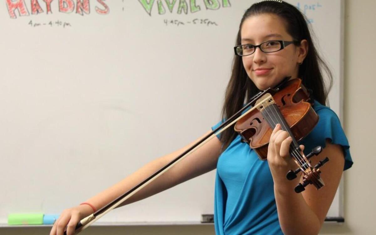 Jessie Marin, 12, started lessons with Kidznotes when she was in second grade and now helps her peers with music.