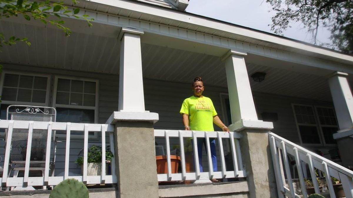 Patricia McClendon standing at her Gurley Street home of 24 years. McClendon said is one of about 80 people on the waiting list for the city’s minor repair program.