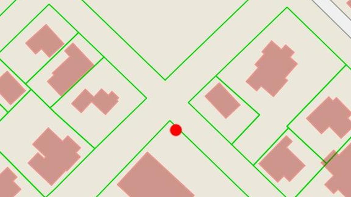 A screen shot of an iPhone using the new Johnston County mobile GIS app shows information about the Clayton Center as a user stands outside of town hall on Second Street.