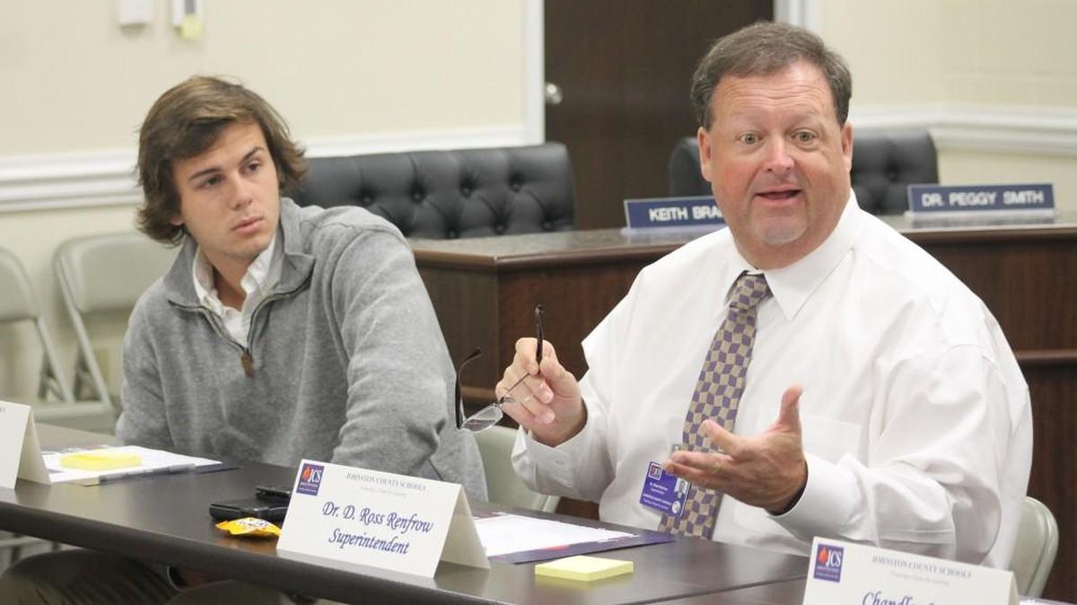 Johnston County Schools Superintendent Ross Renfrow, right, speaks to the Student Advisory Council, made up of representatives from each county high school.