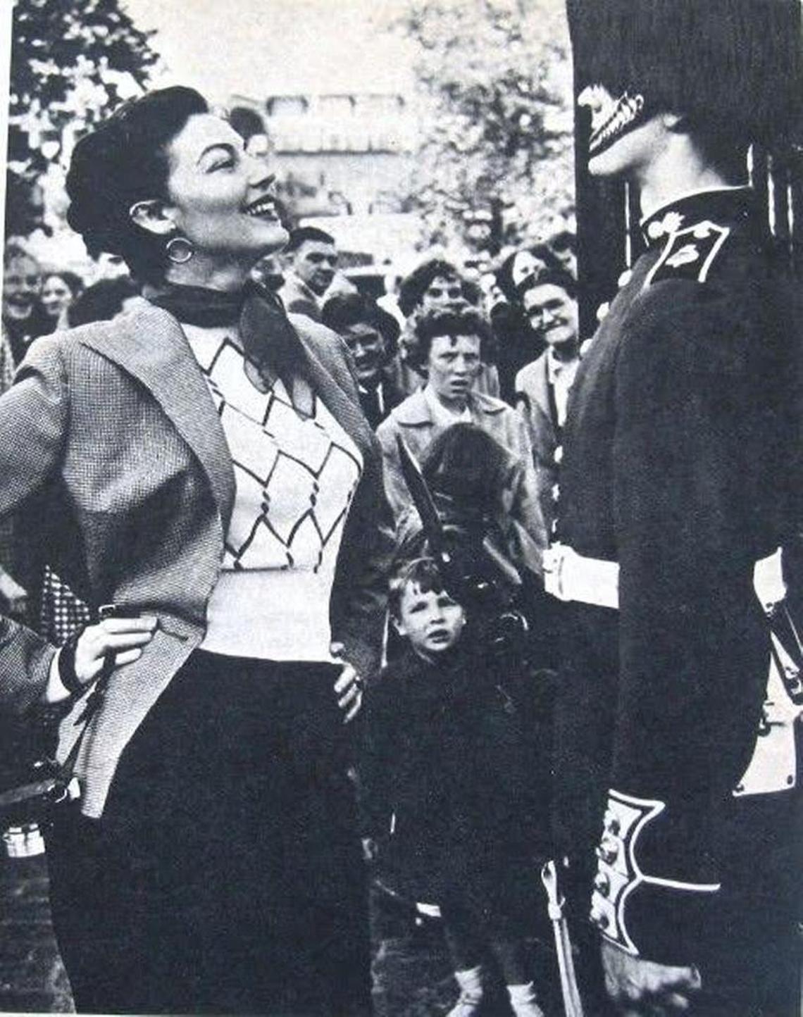 Hollywood actress Ava Gardner tries to get a response from a member of the Queen’s Guard during an appearance in London.