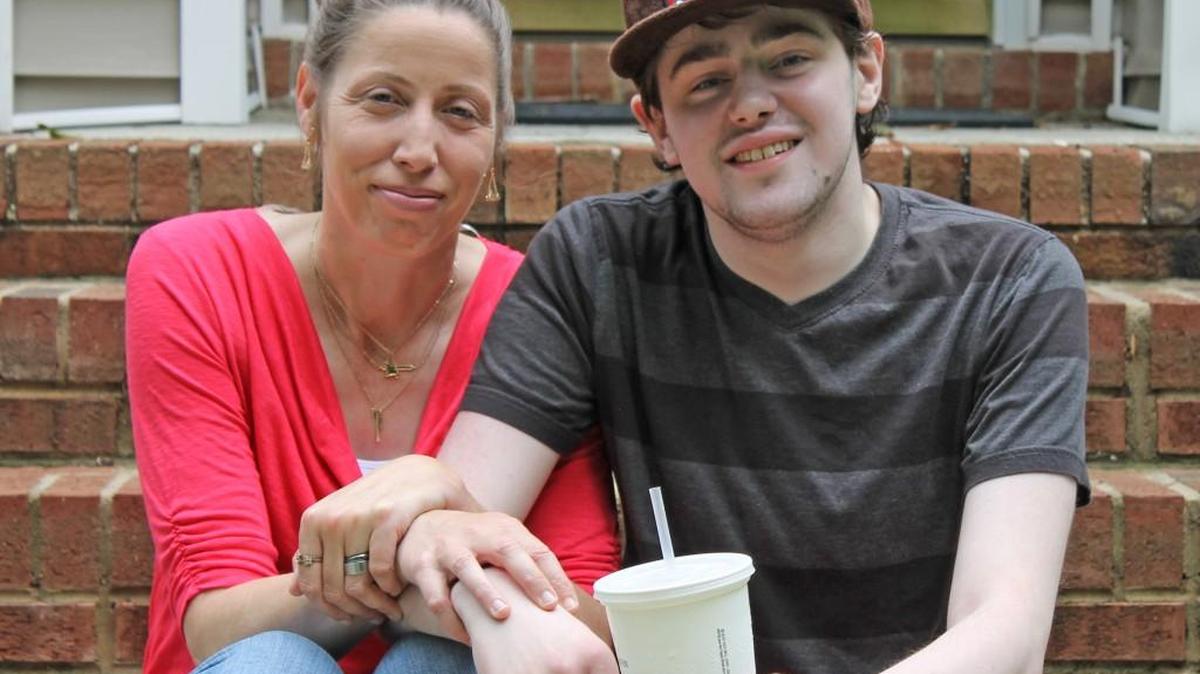 LeAnne Jernigan Wilson Register and her son, Colin Wilson, who has cystic fibrosis and needs a double-lung transplant.