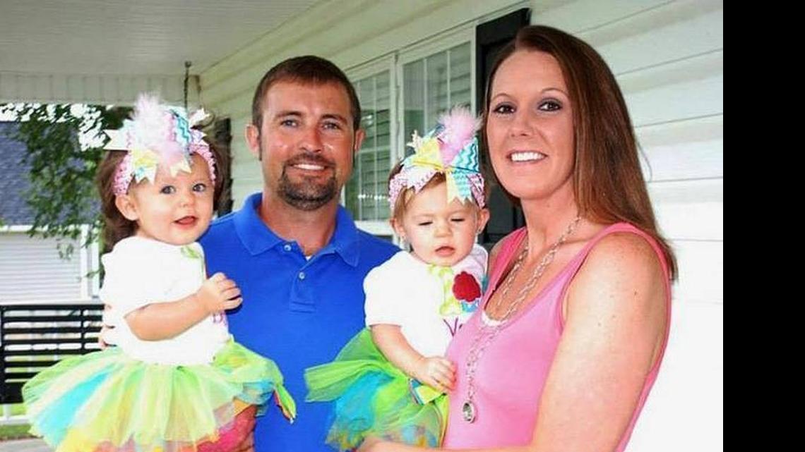 
Grey and Millie Bailey with their twin girls. Grey was killed by a motorist while doing roadwork March 23.
